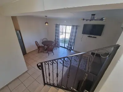 Una televisión o centro de entretenimiento en casa lourdes