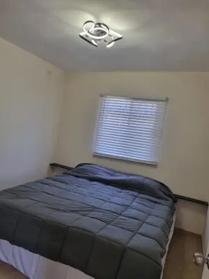 Cama o camas de una habitación en casa lourdes