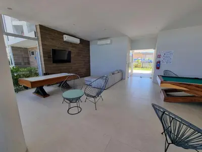 Una televisión o centro de entretenimiento en Te Va a Encantar, Torre Turquesa