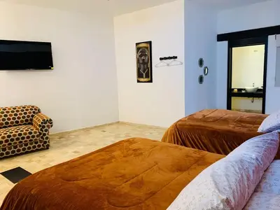 Cama o camas de una habitación en Hotel Boutique El Embrujo Mágico