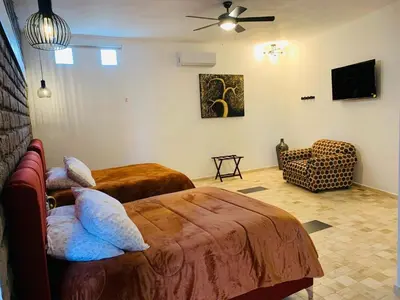 Cama o camas de una habitación en Hotel Boutique El Embrujo Mágico