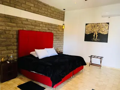 Cama o camas de una habitación en Hotel Boutique Embrujo Encanto