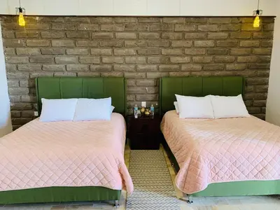 Cama o camas de una habitación en Hotel Boutique Embrujo Luna