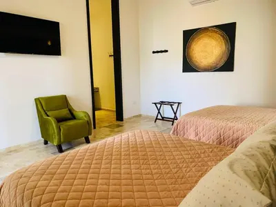 Cama o camas de una habitación en Hotel Boutique Embrujo Luna