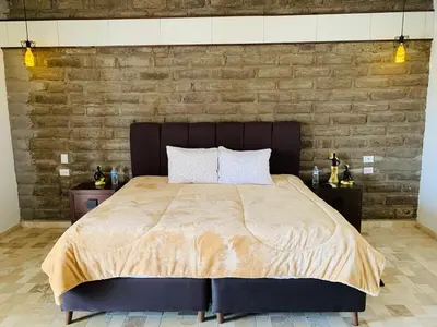 Cama o camas de una habitación en Hotel Boutique Embrujo Deseo