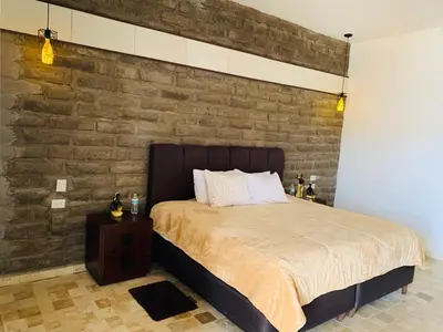 Cama o camas de una habitación en Hotel Boutique Embrujo Deseo