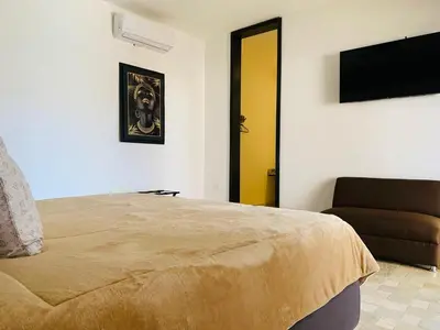 Cama o camas de una habitación en Hotel Boutique Embrujo Deseo