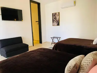 Cama o camas de una habitación en Hotel Boutique Embrujo Intuición