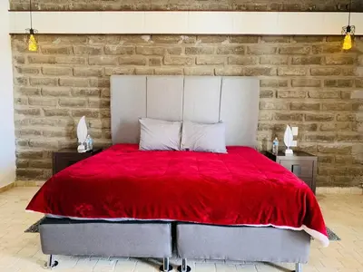 Cama o camas de una habitación en Hotel Boutique Embrujo Hechizo