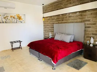 Cama o camas de una habitación en Hotel Boutique Embrujo Hechizo