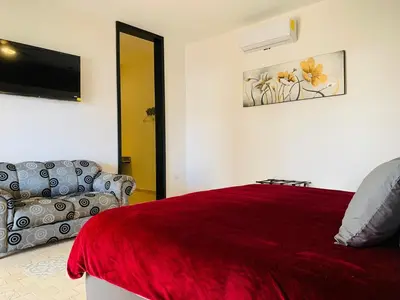Cama o camas de una habitación en Hotel Boutique Embrujo Hechizo