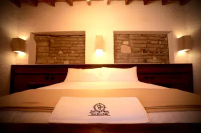 Cama o camas de una habitación en Hotel Villa de la Parra