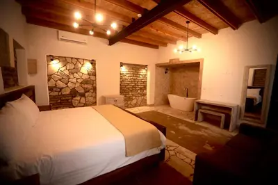 Cama o camas de una habitación en Hotel Villa de la Parra