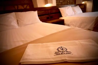 Cama o camas de una habitación en Hotel Villa de la Parra
