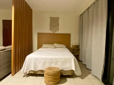 Cama o camas de una habitación en Hermoso condominio frente al mar