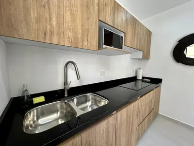 Una cocina o zona de cocina en Un Lugar Ideal cerca de la playa by G P S rentas