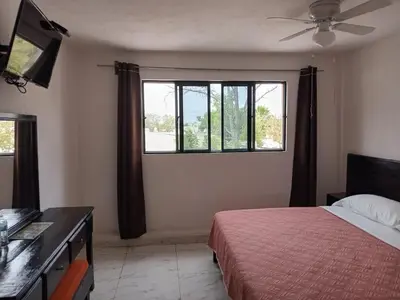 Cama o camas de una habitación en La Terraza-Habitacion 4