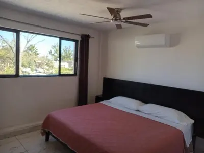 Cama o camas de una habitación en La Terraza-Habitacion 4