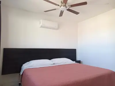 Cama o camas de una habitación en La Terraza-Habitacion 4