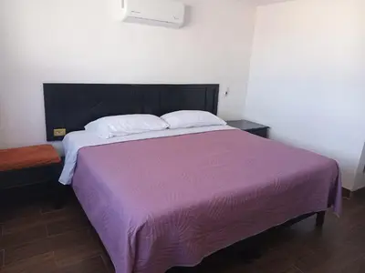 Cama o camas de una habitación en La Terraza-Habitación 8