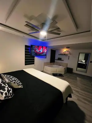 Cama o camas de una habitación en AXEL Suites Diamante Jacuzzi