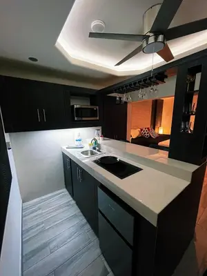 Una cocina o zona de cocina en AXEL Suites Diamante Jacuzzi