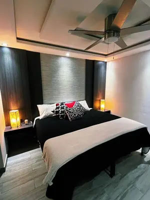 Cama o camas de una habitación en AXEL Suites Diamante Jacuzzi