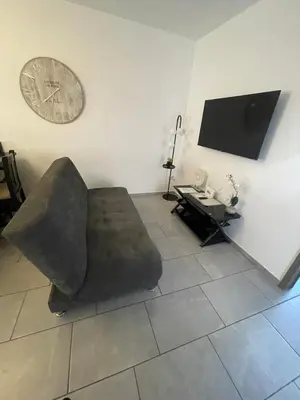 Una televisión o centro de entretenimiento en Departamento completo