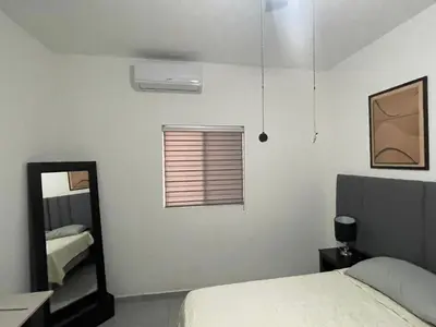 Cama o camas de una habitación en Departamento completo