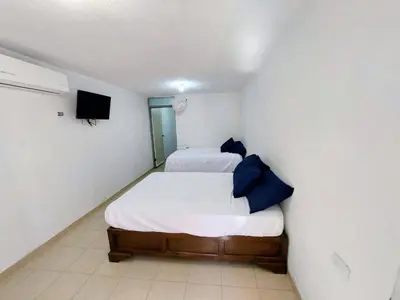Cama o camas de una habitación en Departamento 1 cerca del CAS y consulado,CRIT,Centro de Gobierno y Galerías Mall Cómodo, moderno y con entrada autónoma