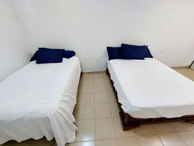 Cama o camas de una habitación en Departamento 1 cerca del CAS y consulado,CRIT,Centro de Gobierno y Galerías Mall Cómodo, moderno y con entrada autónoma