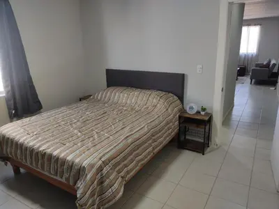 Cama o camas de una habitación en Departamento en Campo 3A