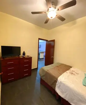 Cama o camas de una habitación en Eva Departamentos