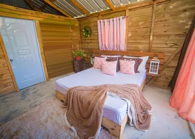 Cama o camas de una habitación en Natural Retreat with Jacuzzi and Stunning Views in Vista al Valle