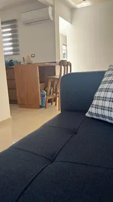 Zona de estar de Casa 2 habitaciones más sofá