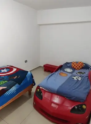 Cama o camas de una habitación en Casa 2 habitaciones más sofá
