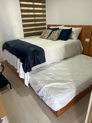 Cama o camas de una habitación en Departamento en Almarena Residencial