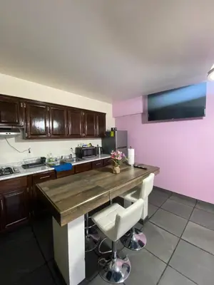 Una cocina o zona de cocina en Eva Departamentos