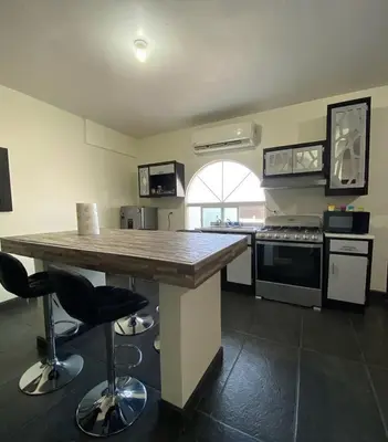 Una cocina o zona de cocina en Eva Departamentos