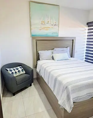 Cama o camas de una habitación en Marina Cerritos Azul Turquesa #3 - 4 Albercas - 1 Min Playas