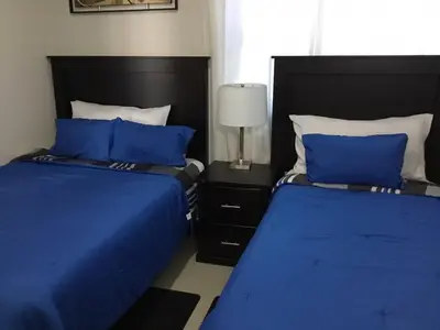 Cama o camas de una habitación en Comfortable Durango Apartment