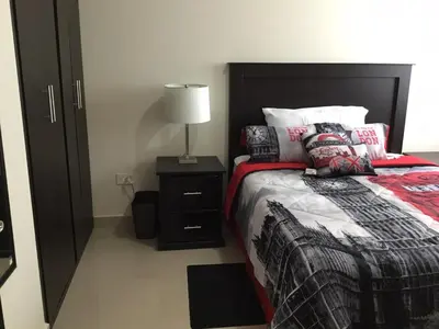 Cama o camas de una habitación en Comfortable Durango Apartment