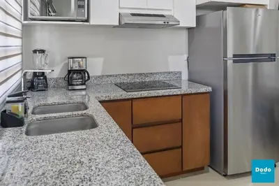 Una cocina o zona de cocina en Residencial a 5 min. de plaza comercial