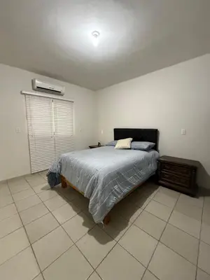 Cama o camas de una habitación en Departamento en San Buenaventura