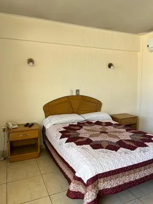 Cama o camas de una habitación en Hotel Posada del Yaqui