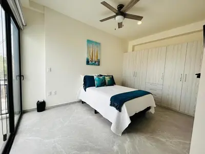 Cama o camas de una habitación en Beautiful 50 steps from the beach Torre Q