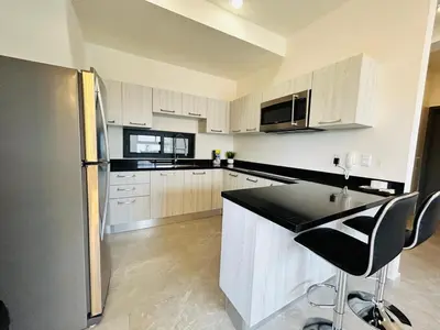 Una cocina o zona de cocina en Beautiful 50 steps from the beach Torre Q