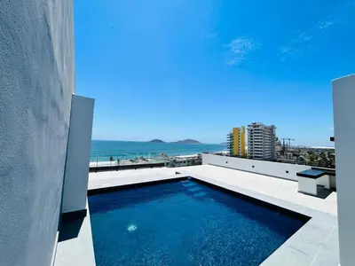 Piscina en o cerca de Beautiful 50 steps from the beach Torre Q