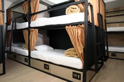 Cama o camas de una habitación en Hotel Grand Lion