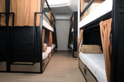 Cama o camas de una habitación en Hotel Grand Lion